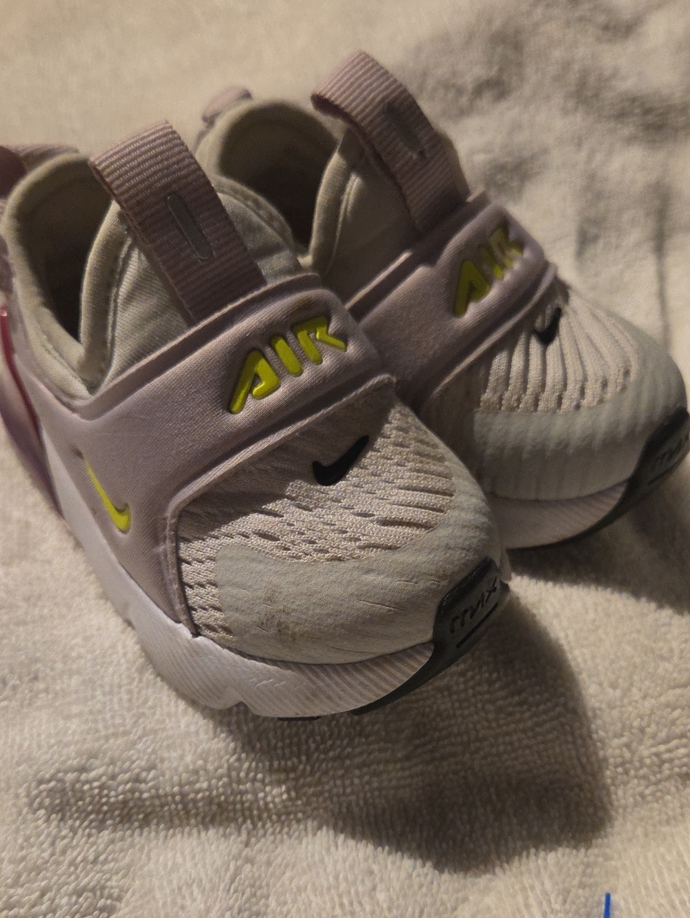 Nike Kids Slip-On Air Sneakers in Light Pink and Yellow Accents